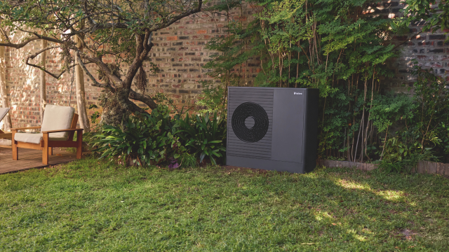 aroTHERM plus heat pump in a garden.