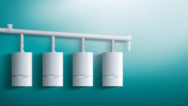 four ecoTEC plus boilers on a rig on a green background