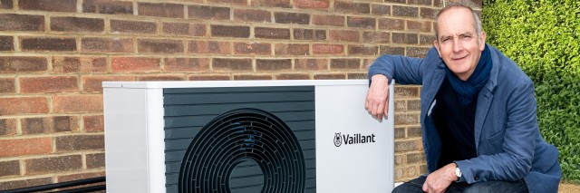 an aroTHERM plus heat pump wrapped in brickwork