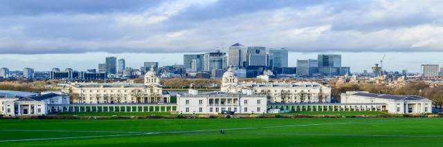 A zoomed out view of Greenwich park, with the Isle of Dogs in the background