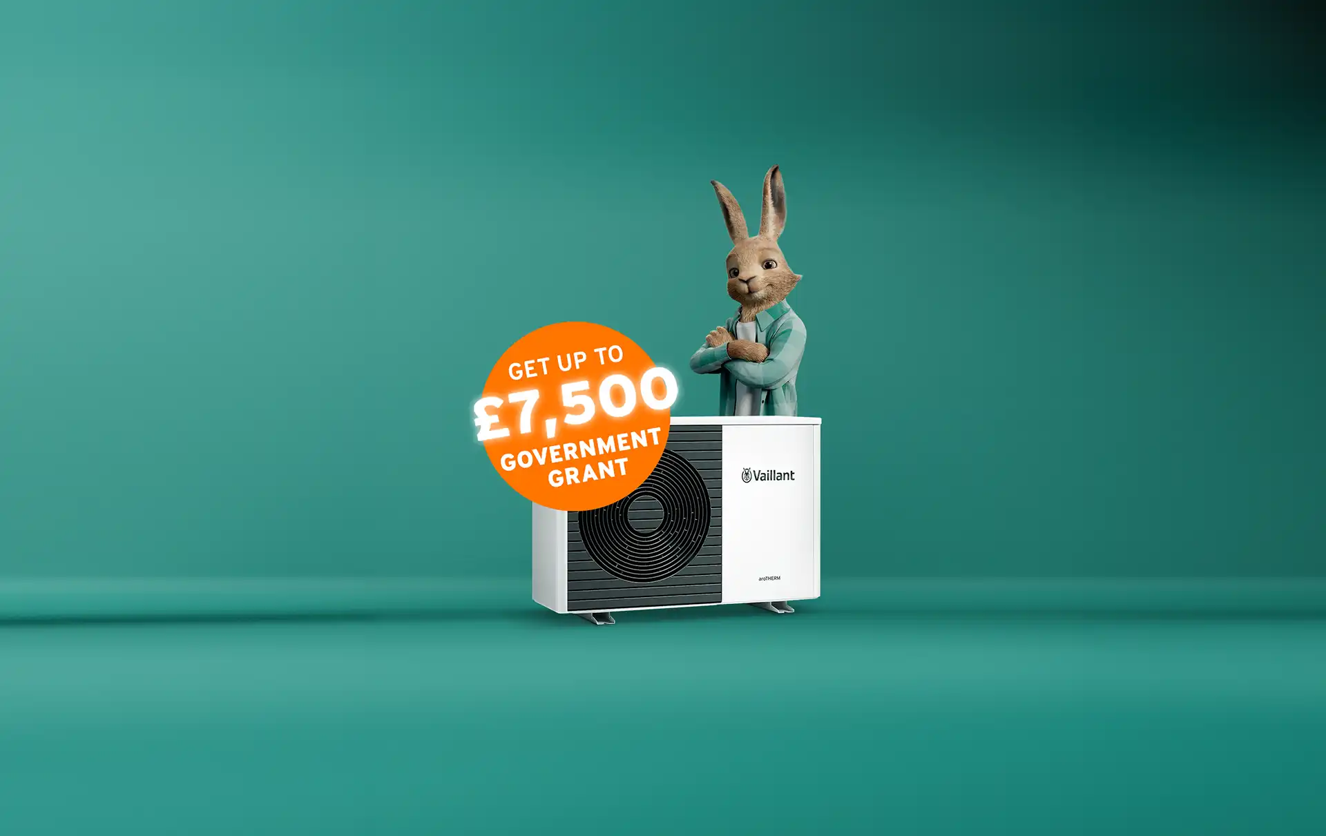The Vaillant hare standing behind an aroTHERM plus heat pump with an orange circle sticker saying 'Get up to £7,500 government grant'
