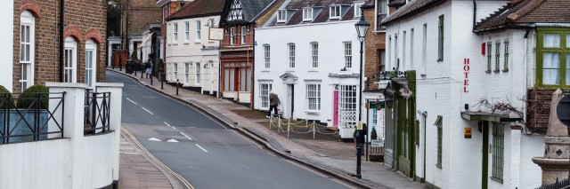 Historic buildings on the corner of High Street and West Street at Harrow on the Hill, picturesque suburb in greater London