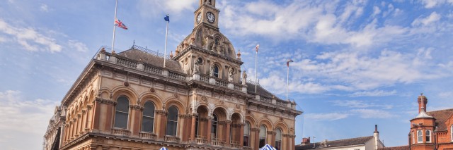 People shopping at Ipswich Corn Exchange and market.