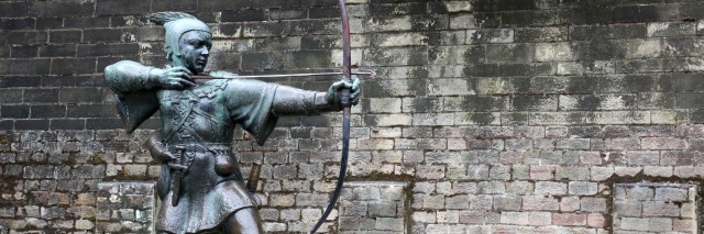 Bronze statue of Robin Hood firing an arrow
