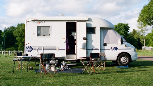 caravan in a grassy field