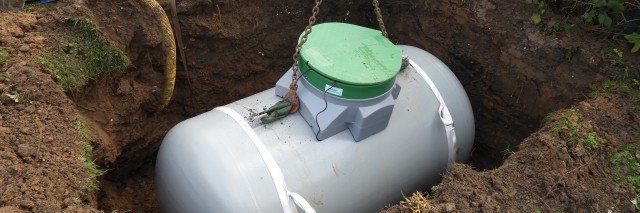 LPG tank being lowered into the ground