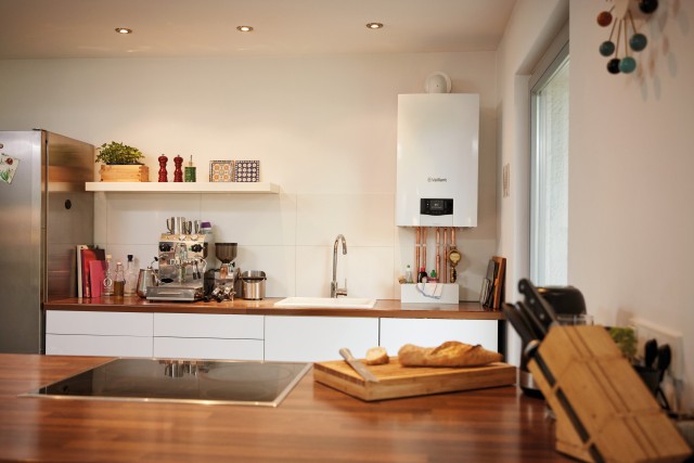 boiler standing on a wall in a kitchen