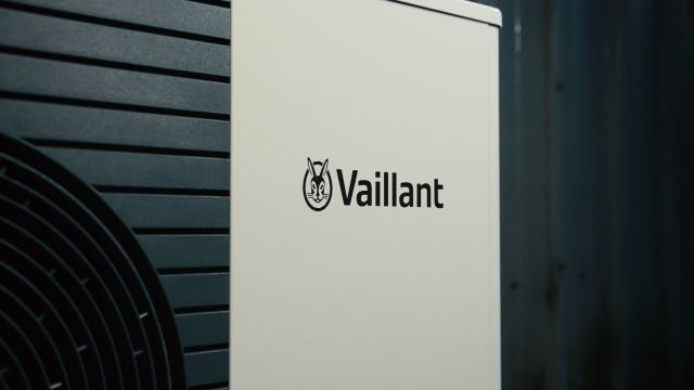 Close-up of a heat pump featuring the word 