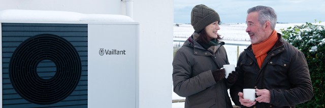 an aroTHERM plus heat pump wrapped in brickwork