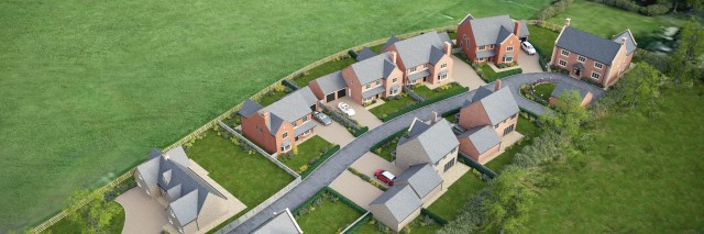 airel view of a housing estate with grass