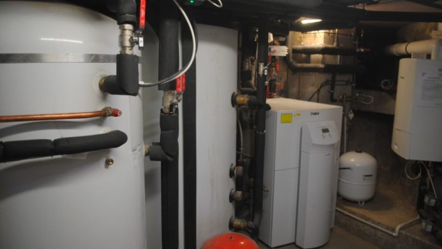 heat pump and cylinder inside a home