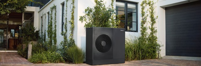aroTHERM plus heat pump outside a house