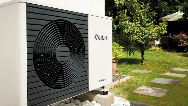 Vaillant aroTHERM plus heat pump outside home