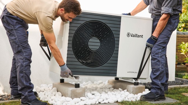 two men fitting an installer
