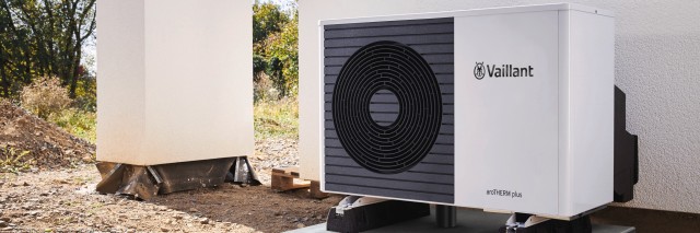 heat pump outside a white wall heat pump outside a white wall