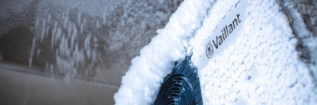an aroTHERM plus heat pump in snow